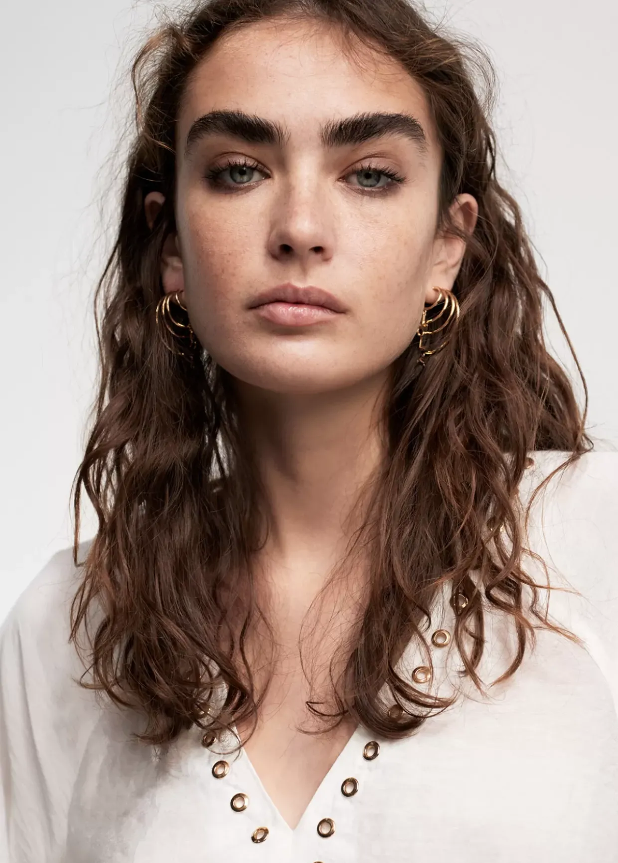 Blusa detalle eyelets