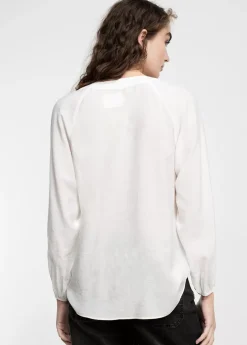Blusa detalle eyelets