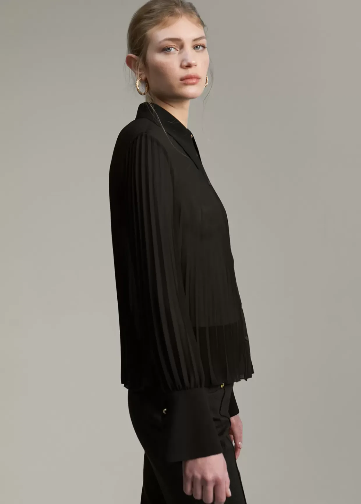 Blusa plisada