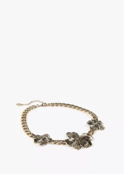 Collar dorado con flores