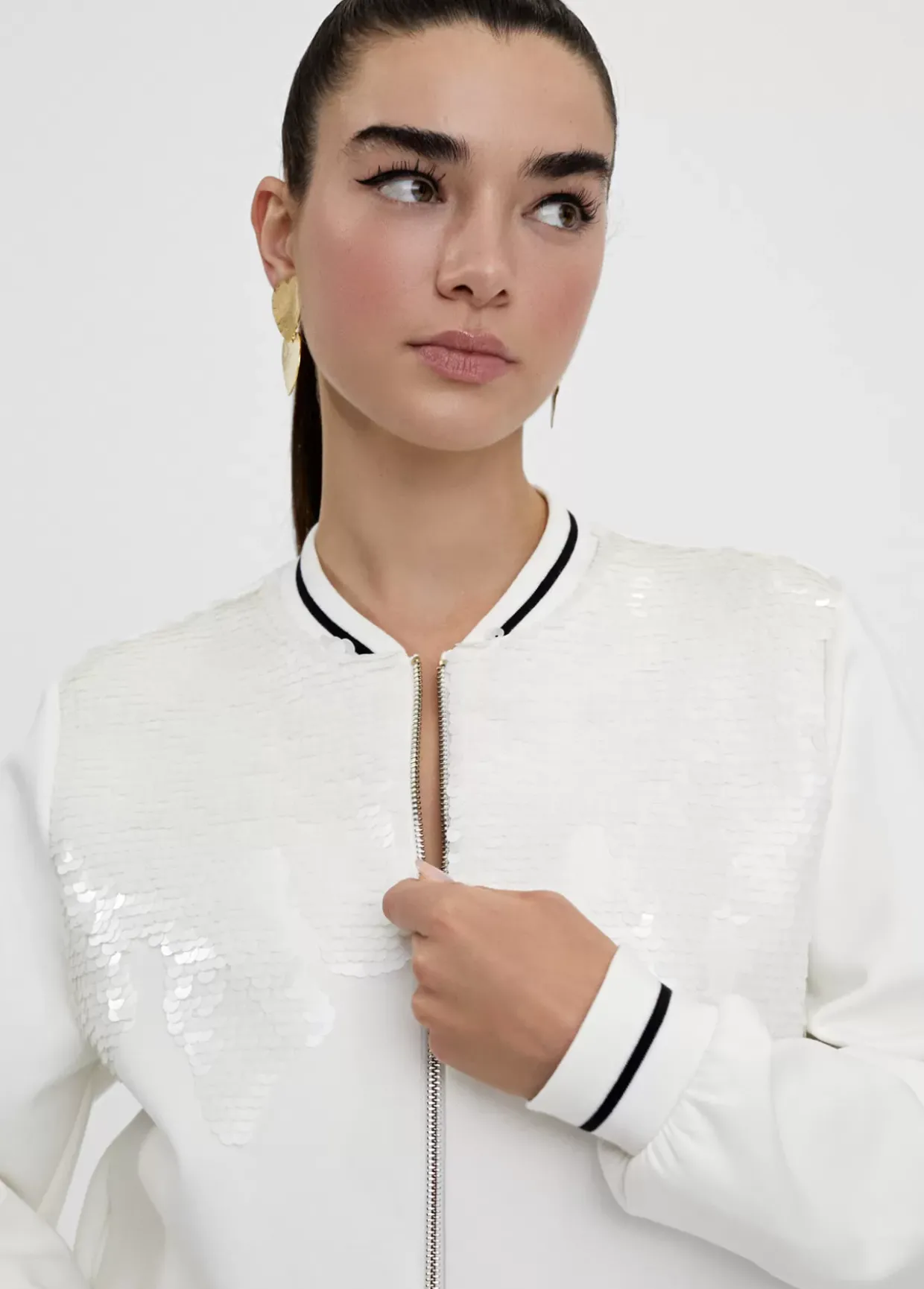 Sudadera cremallera con lentejuelas