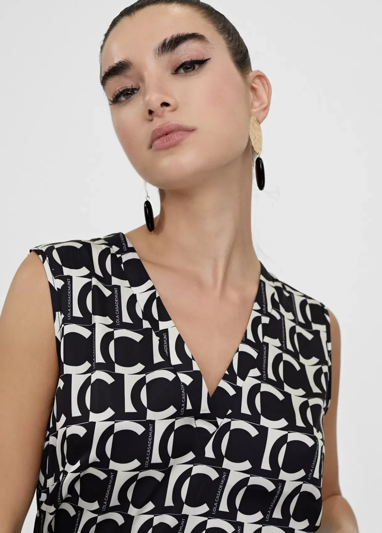 Top fluido monograma